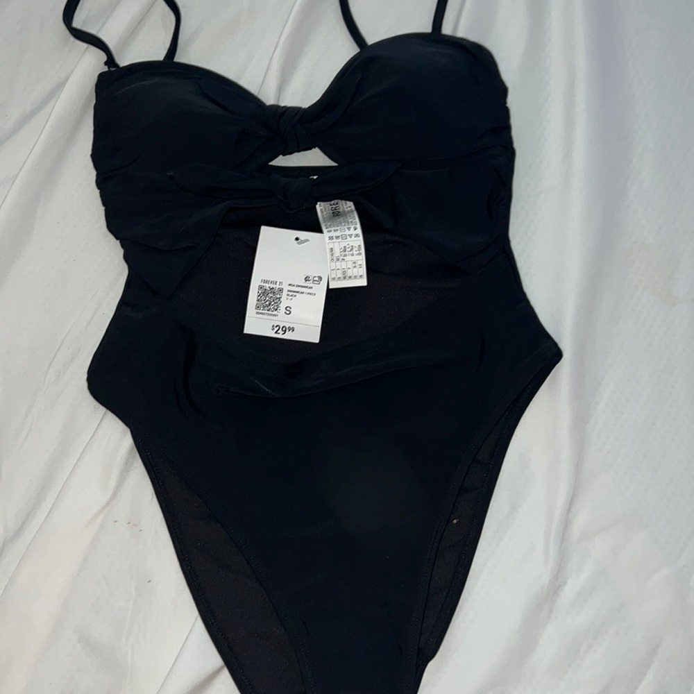 Forever 21 size small swimsuit . Open cut in the middle. Brand new w tags